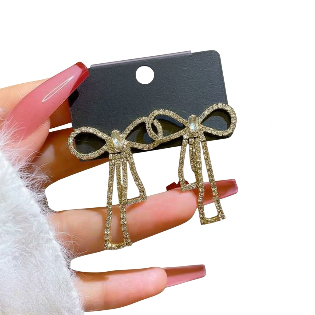 PQT-985 Touch Of Glamour To Your Look With These Bow Shape Zircon Korean Earrings ? Color Golden