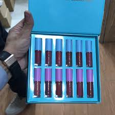 Set 12 Lip Gloss Kevin&Coco, nuante de rosu si rose, cutie dreptunghiulara, 26.5x16.5x2.2 cm, 200 g, multicolor