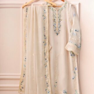 Agha Noor Chiffon Collection: Exquisite Embroidered Cream & Blue Suit - Immerse yourself in the unparalleled elegance of 