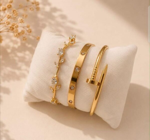02eb5c3118480ddf1b2056f959aaa4c3 3-Piece Golden Cartier & Nail Style Bracelet Set