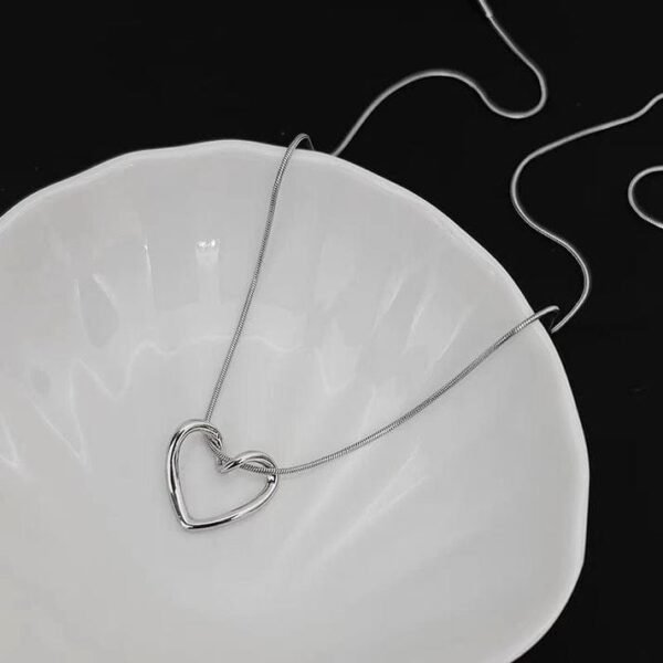 6cf94b5546a43a93146142f1e987e33d PRJ-183 Hollow Heart Pendant – Elegant Stainless Steel Necklace, Stylish Jewellery Accessory for Women