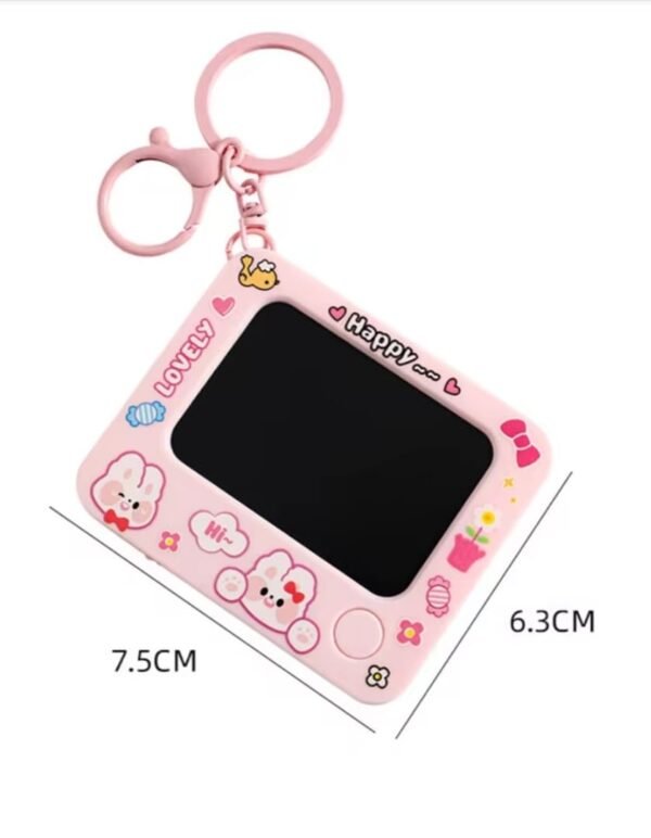 WhatsApp-Image-2025-08-15-at-3.07.08-PM-1 Creative Mini Graffiti Board Keychain – Cute Cartoon Bag Pendant & Reusable Drawing Tablet for Students, Kids & Artists (Random Color)