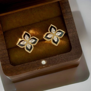 WhatsApp-Image-2025-08-21-at-2.18.22-AM-1_cleanup Black and Gold Floral Earrings – Sparkling Four-Leaf Studs with Cubic Zirconia (PJT-991)