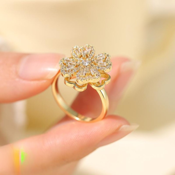 WhatsApp-Image-2025-08-26-at-5.14.45-PM_cleanup Clover Zircon Rotating Ring – Elegant Adjustable Spinner Ring for Women & Girls, Silver & Golden Finish (QSJ-110)